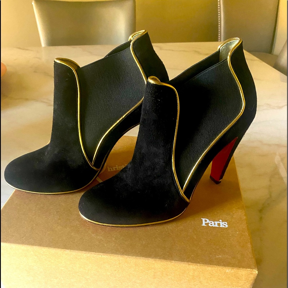 Christian Louboutin Lou Lou boot 100 in black and gold suede pull on bootie.